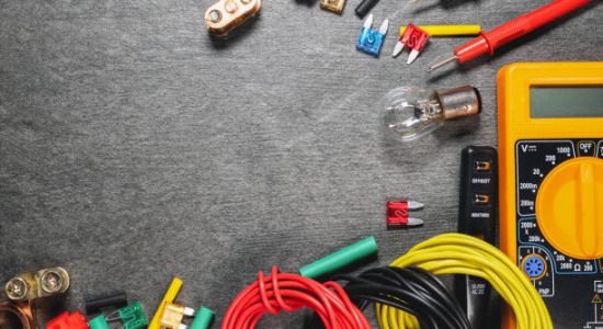 Car electrical equipment on dark background with copy space. Car electrical equipment on dark background with copy space.
